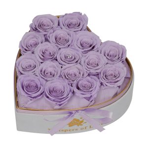 purple preserved roses in a box
